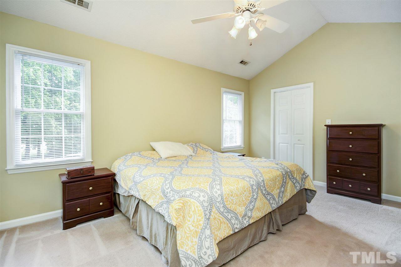 5300 Halcott Court Raleigh, NC 27613 - Photo 14 of 23 Master bedroom with owner's suite including large walk in closet.