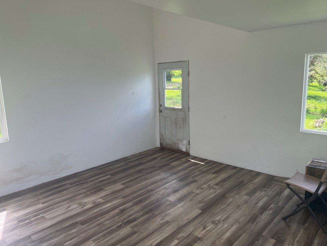 81-1084 Lot F-32 Captain Cook Road Captain Cook, HI 96704 - Photo 5 of 15 a view of an empty room and window
