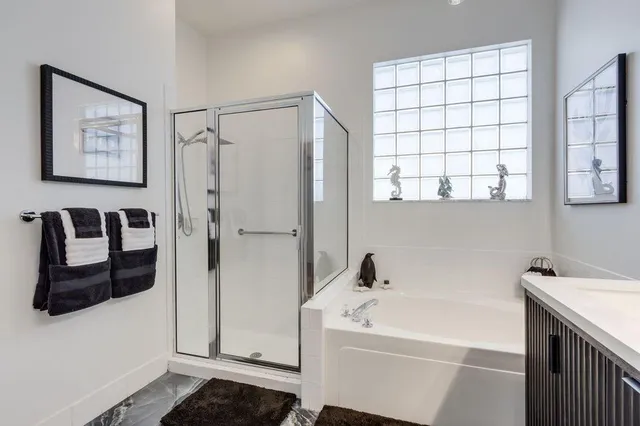 a view of a house with swimming pool and porch with furniture