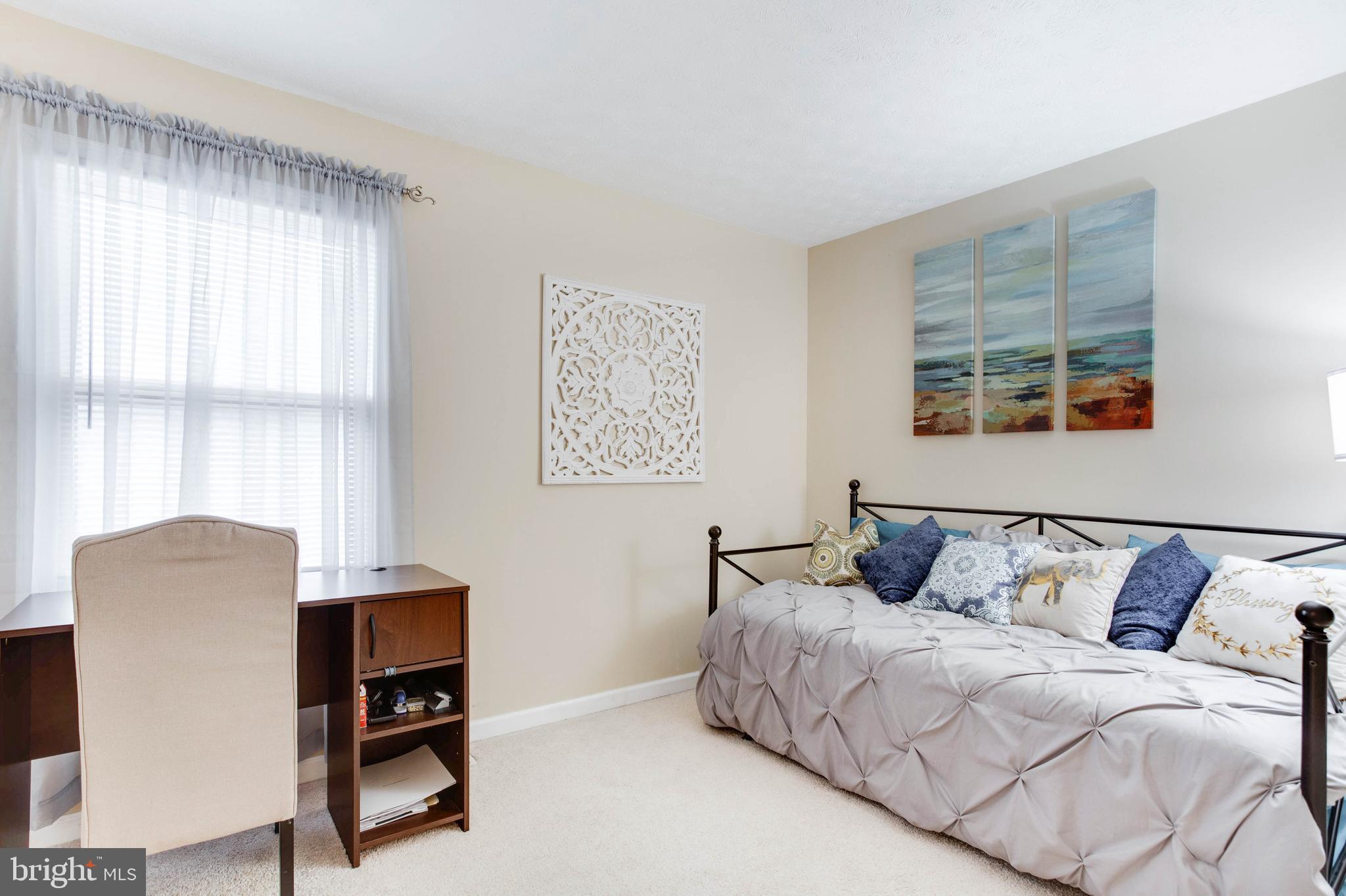 1872 Montreal Road Severn, MD 21144 - Photo 26 of 36 a bedroom with a bed and wooden floor