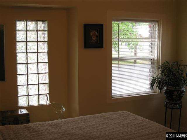 601 Imperial Boulevard Reno, NV 89503 - Photo 11 of 13 a bedroom with a bed next to a window
