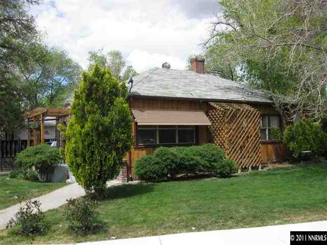 601 Imperial Boulevard Reno, NV 89503 - Photo 2 of 13 a front view of a house with a garden