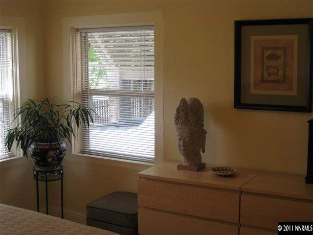 601 Imperial Boulevard Reno, NV 89503 - Photo 10 of 13 a room with a window and potted plant
