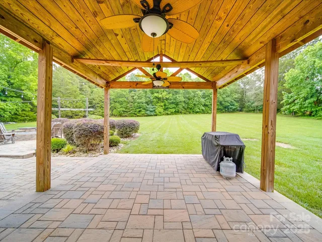 a view of a yard with an outdoor space