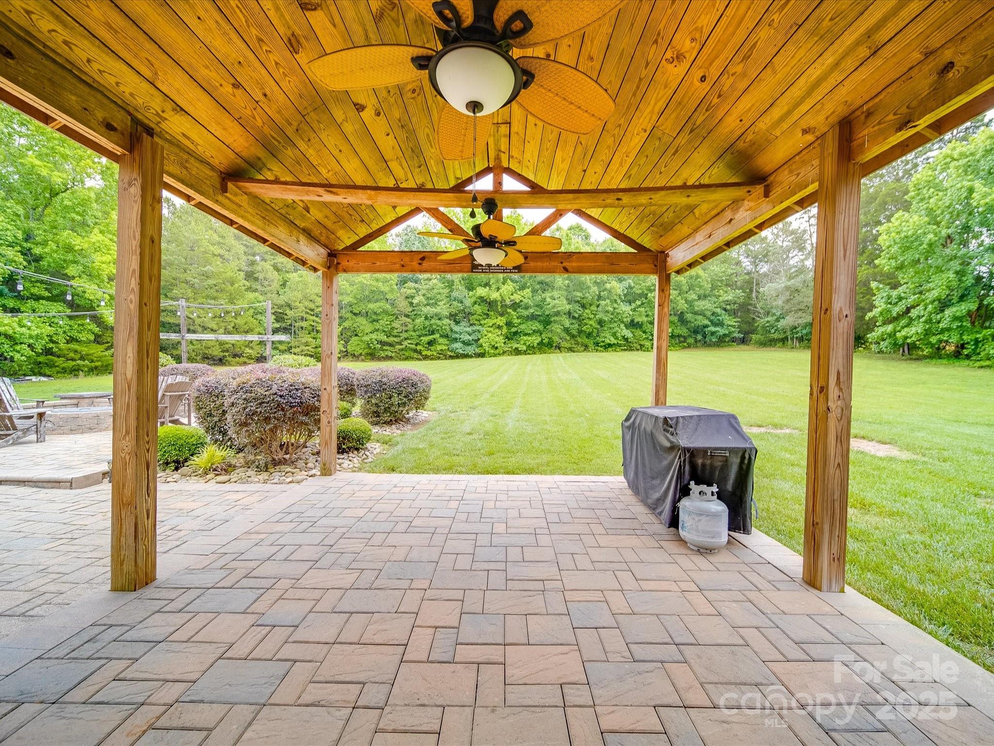 1060 South Lentz Harness Shop Road Mount Pleasant, NC 28124 - Photo 14 of 48 a view of a yard with an outdoor space