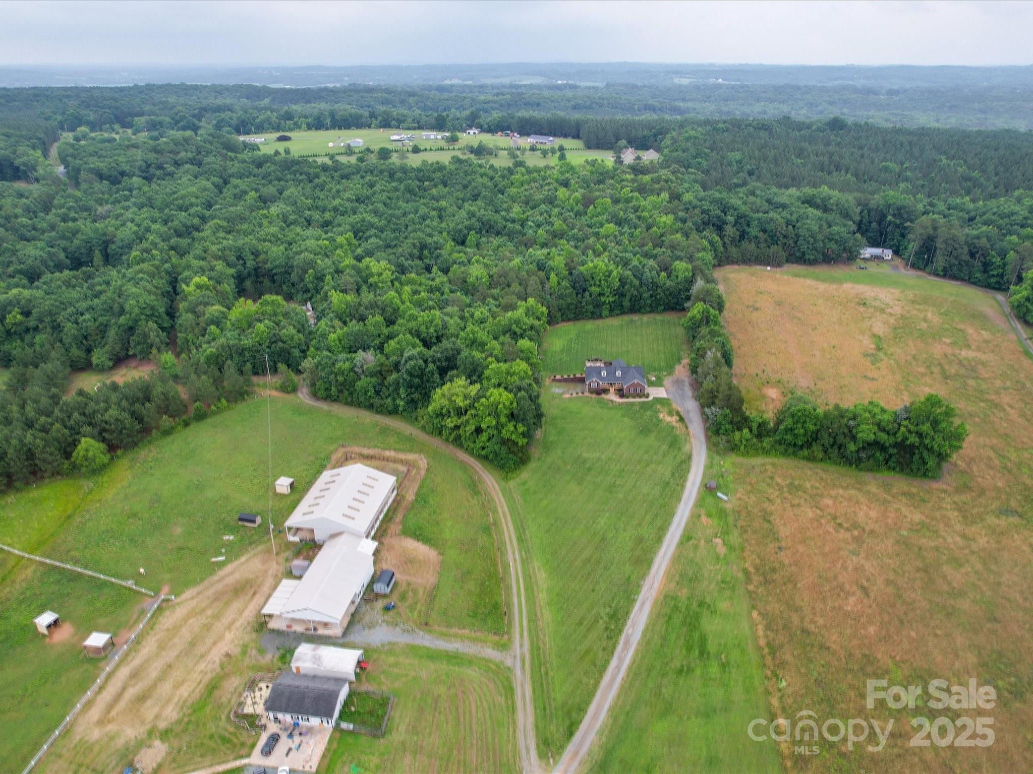 1060 South Lentz Harness Shop Road Mount Pleasant, NC 28124 - Photo 44 of 48 an aerial view of a house