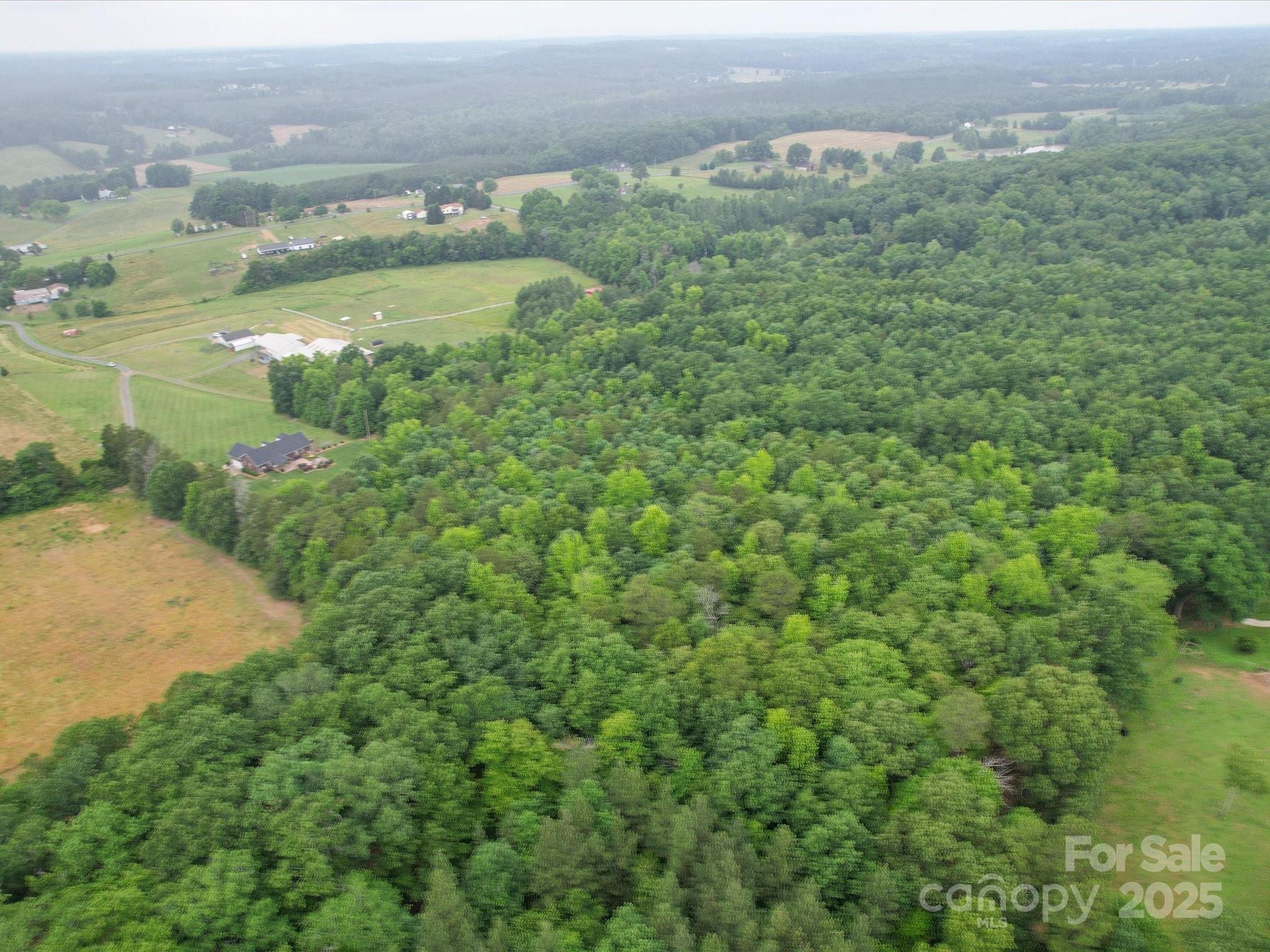 1060 South Lentz Harness Shop Road Mount Pleasant, NC 28124 - Photo 47 of 48 a view of a lake with a city