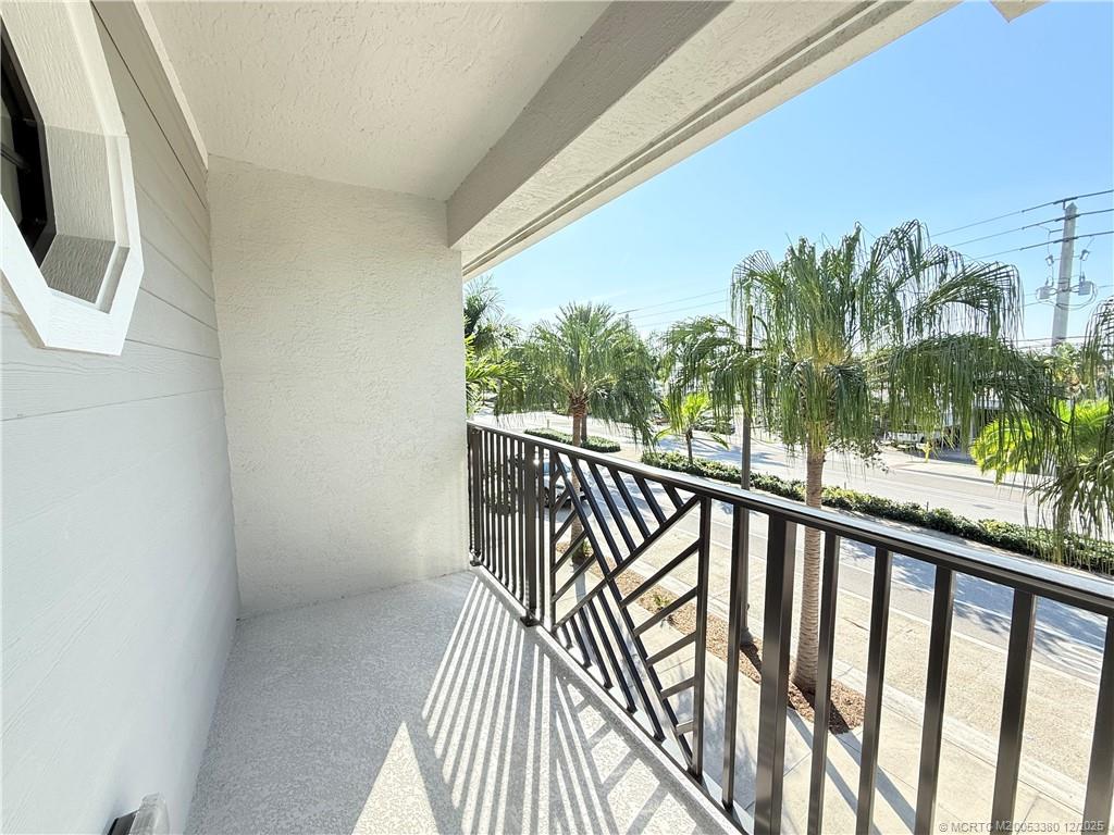 3375 Southwest Mapp Road, Unit 206 Palm City, FL 34990 - Photo 14 of 34 a view of balcony with furniture