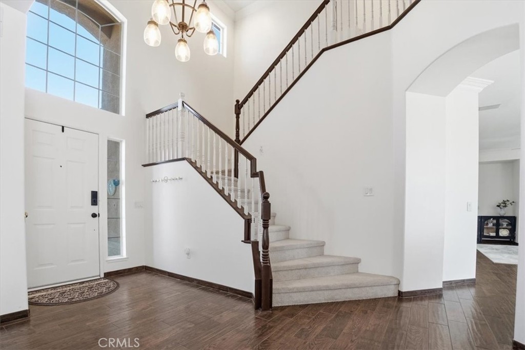 768 Ochee Circle Corona, CA 92879 - Photo 11 of 75 a view of entryway and hall with wooden floor