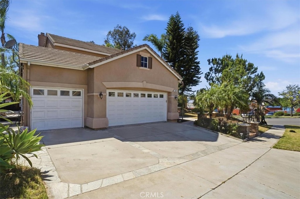 768 Ochee Circle Corona, CA 92879 - Photo 14 of 75 a view of a house with a yard