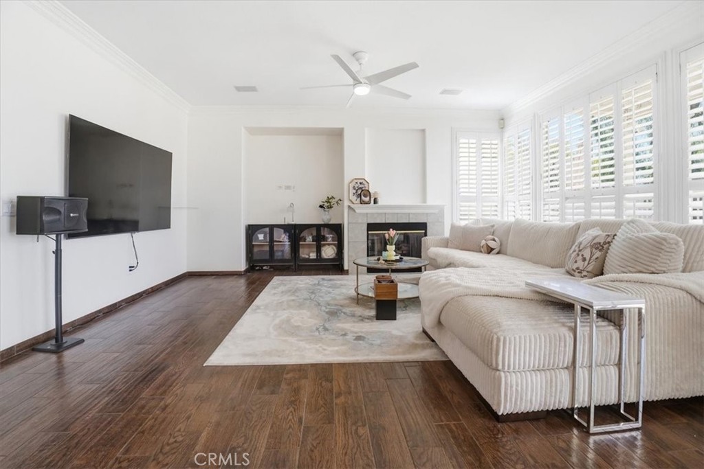 768 Ochee Circle Corona, CA 92879 - Photo 20 of 75 a living room with furniture and a flat screen tv