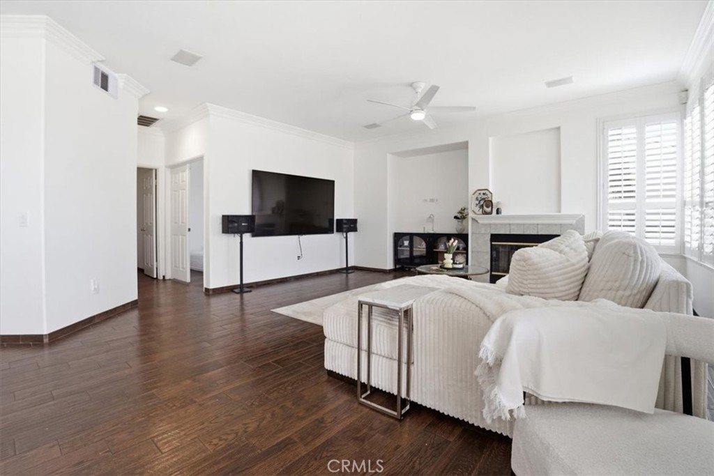 768 Ochee Circle Corona, CA 92879 - Photo 22 of 75 a living room with furniture and a flat screen tv