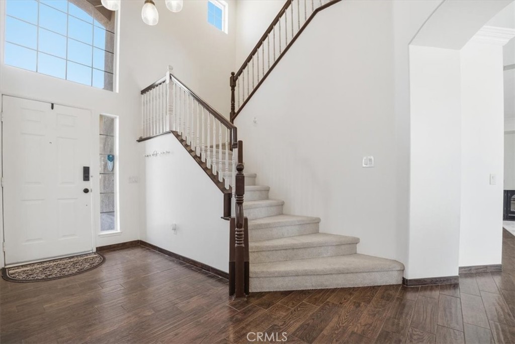 768 Ochee Circle Corona, CA 92879 - Photo 33 of 75 a view of entryway and hall with wooden floor