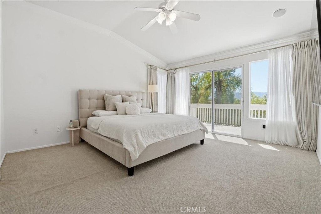 768 Ochee Circle Corona, CA 92879 - Photo 43 of 75 a bedroom with a bed and a large window