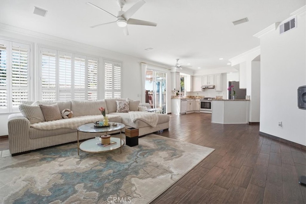 768 Ochee Circle Corona, CA 92879 - Photo 5 of 75 a living room with furniture and kitchen view