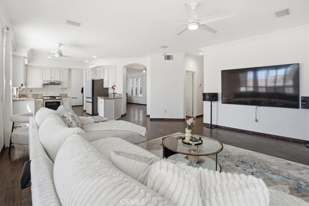 768 Ochee Circle Corona, CA 92879 - Photo 6 of 75 a living room with furniture and a flat screen tv