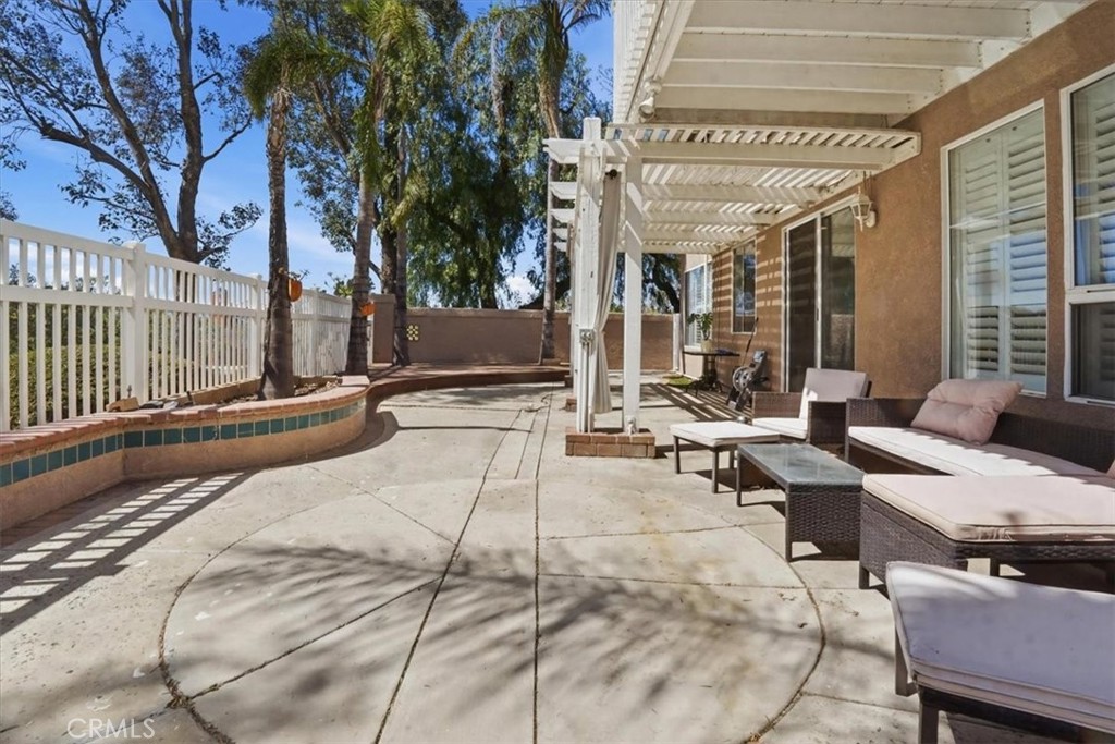 768 Ochee Circle Corona, CA 92879 - Photo 69 of 75 a view of balcony with couch and chairs