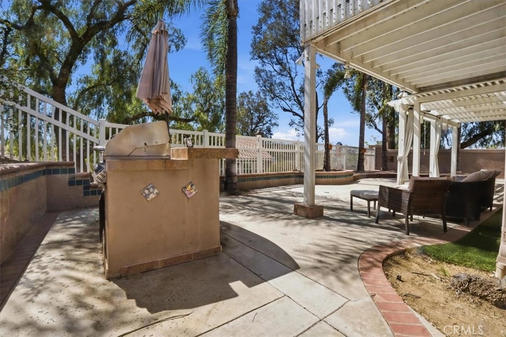 768 Ochee Circle Corona, CA 92879 - Photo 71 of 75 a view of a backyard with sitting area