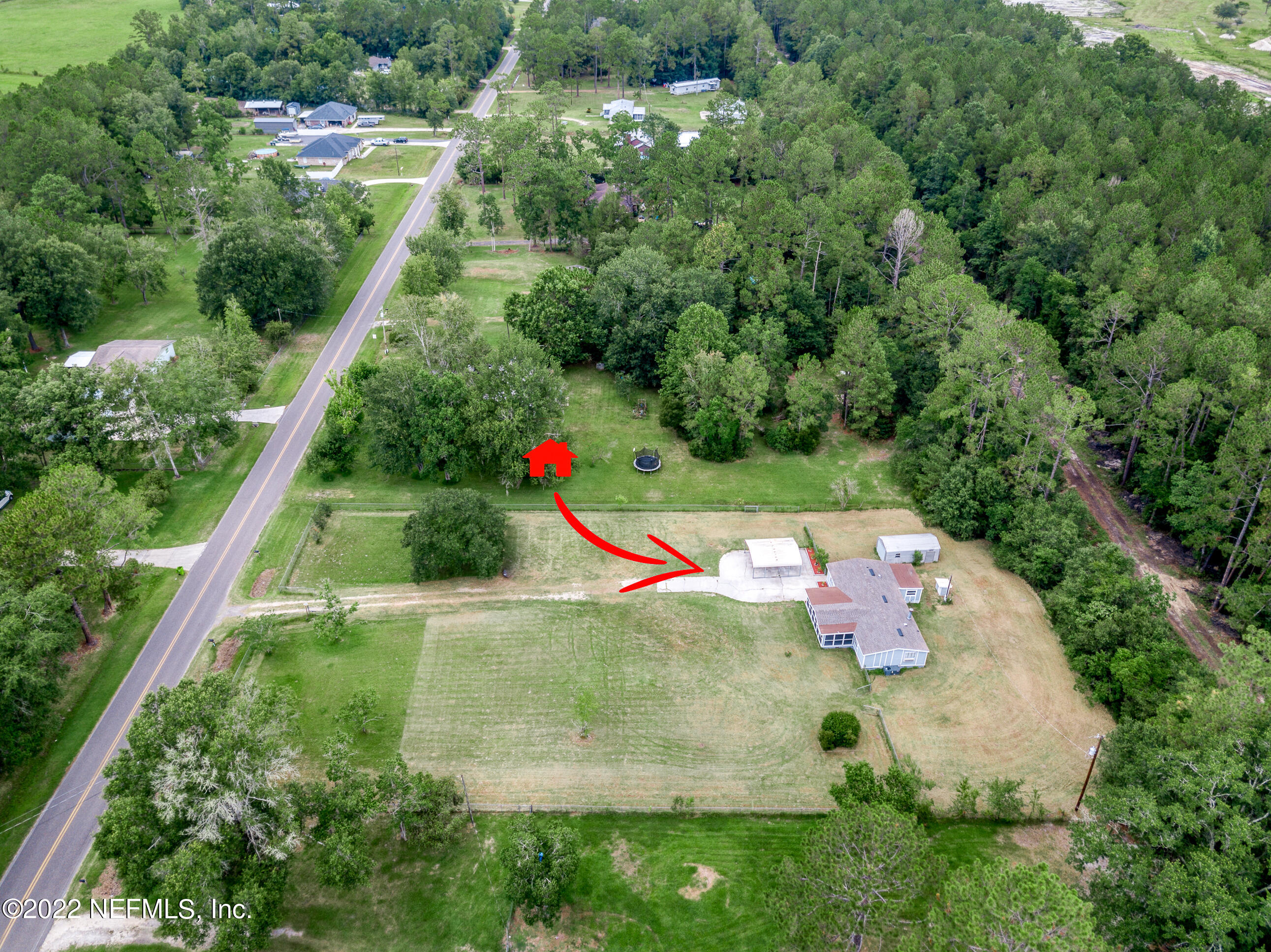 54360 Church Road Callahan, FL 32011 - Photo 35 of 37 an aerial view of residential house with outdoor space and swimming pool