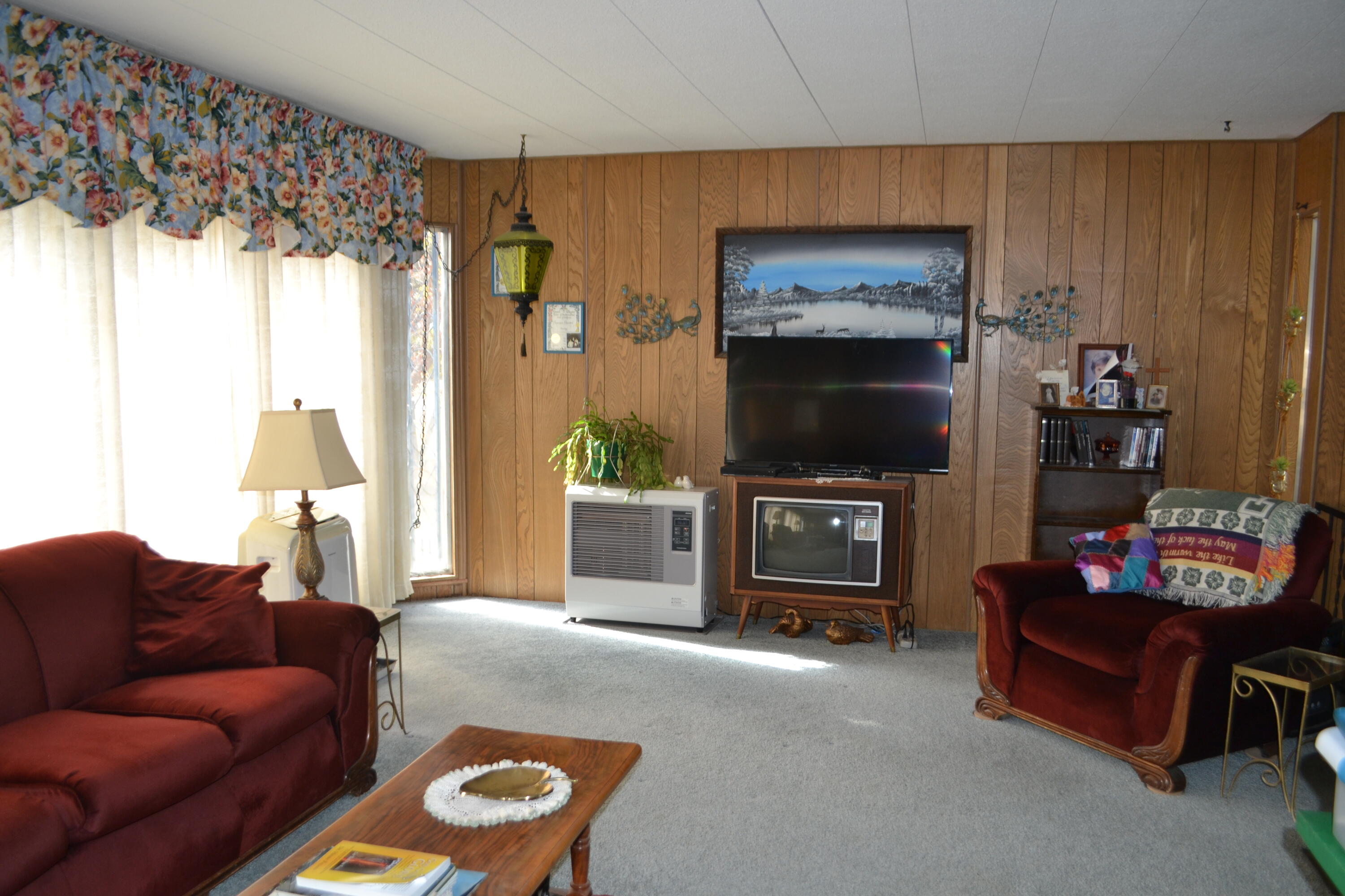 309 Punkin Center Road Bieber, CA 96009 - Photo 12 of 34 a living room with furniture and a flat screen tv