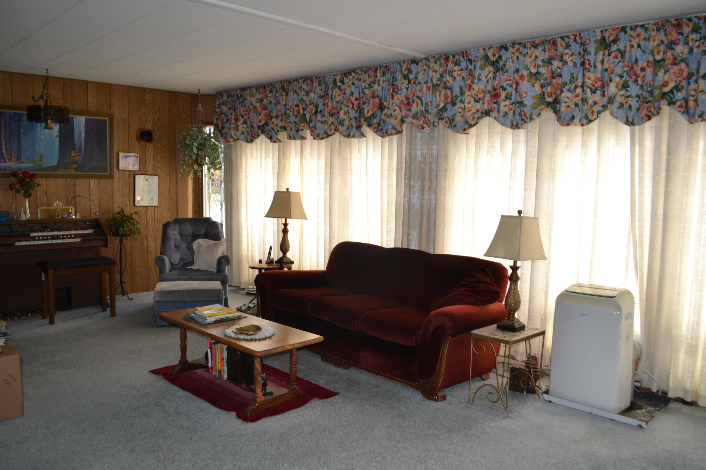 309 Punkin Center Road Bieber, CA 96009 - Photo 13 of 34 a living room with furniture and a large window
