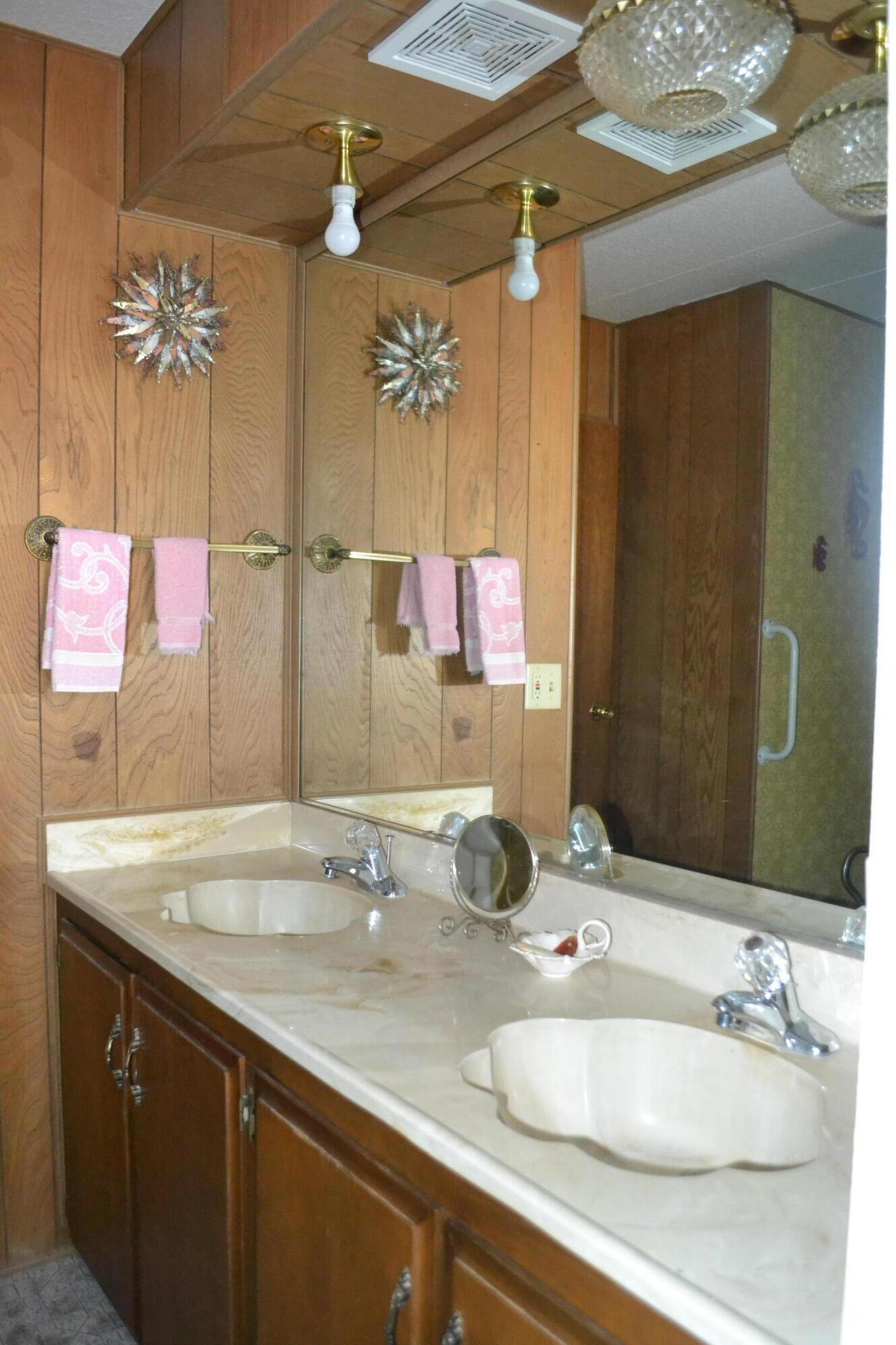 309 Punkin Center Road Bieber, CA 96009 - Photo 17 of 34 a bathroom with a sink double vanity and a mirror