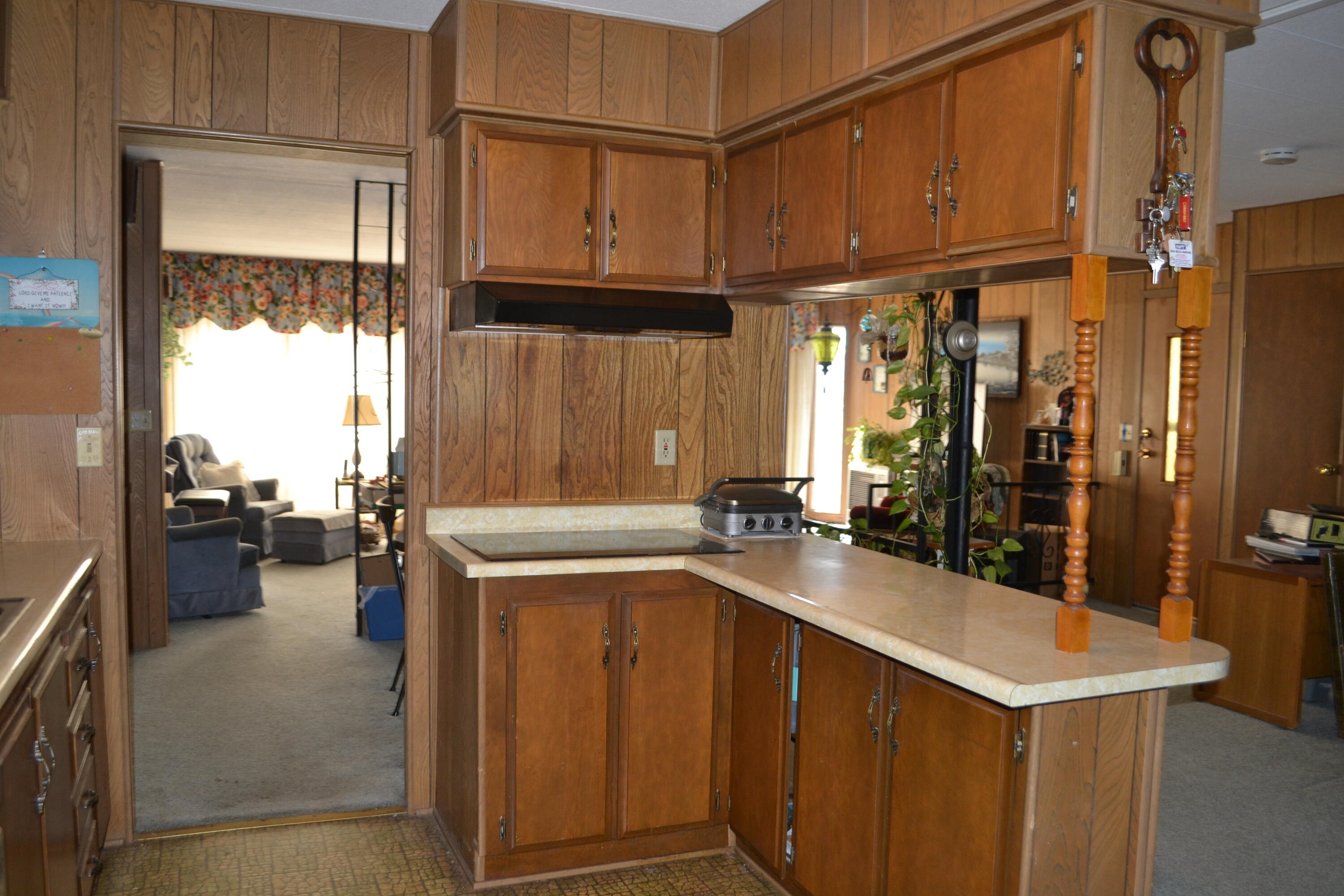 309 Punkin Center Road Bieber, CA 96009 - Photo 7 of 34 a kitchen with a sink appliances and cabinets