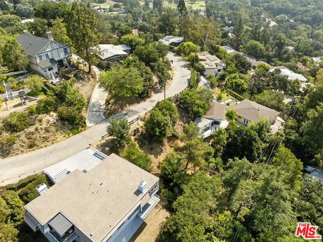 a bathroom with a sink and a shower curtain