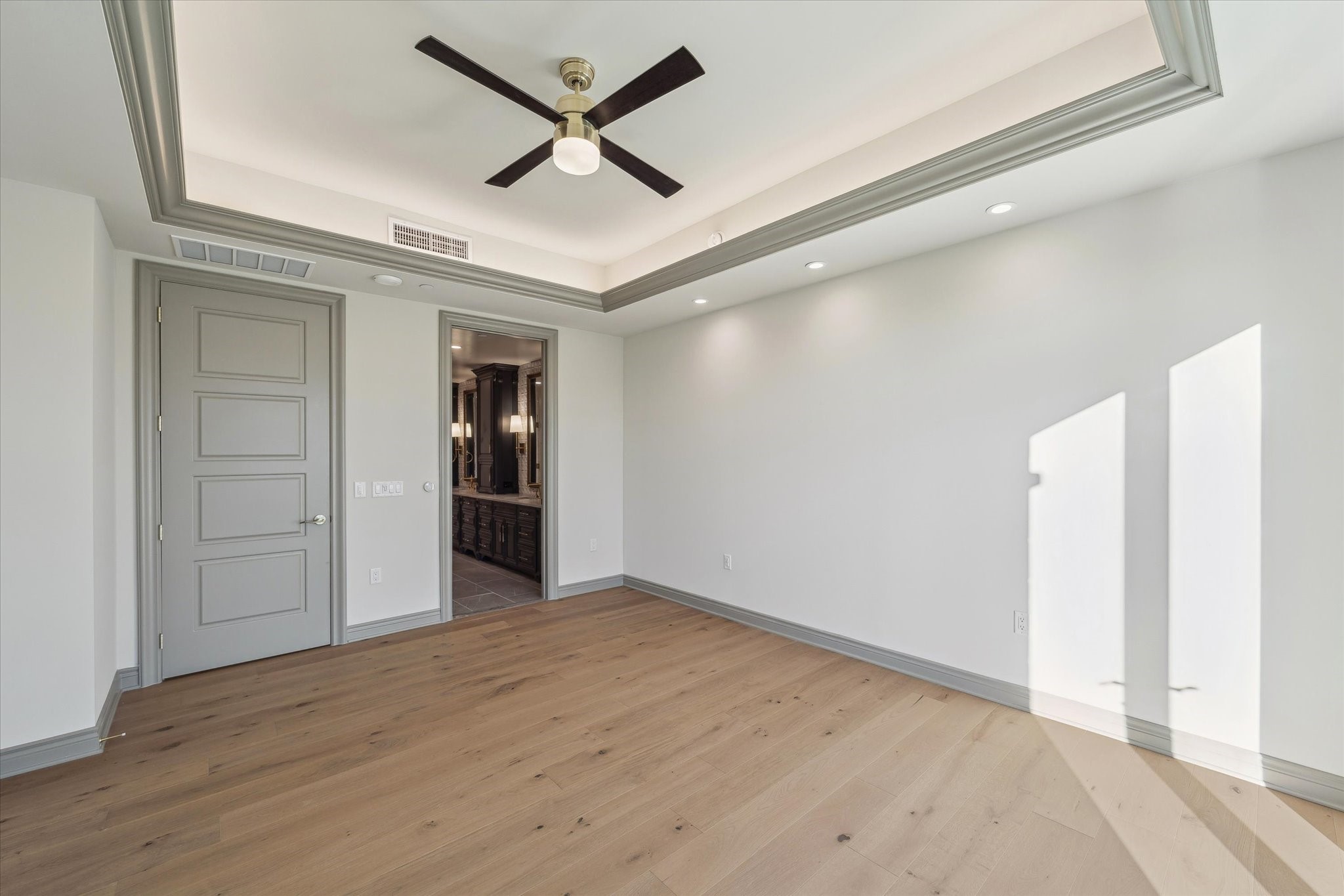 1717 Bissonnet Street, Unit 605 Houston, TX 77005 - Photo 14 of 32 Primary suite looking towards the primary bathroom.