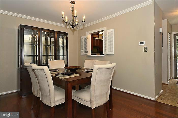 127 Kinsman View Circle Silver Spring, MD 20901 - Photo 5 of 21 a dining room with furniture and chandelier