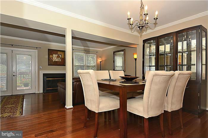 127 Kinsman View Circle Silver Spring, MD 20901 - Photo 6 of 21 a view of a dining room with furniture window and wooden floor