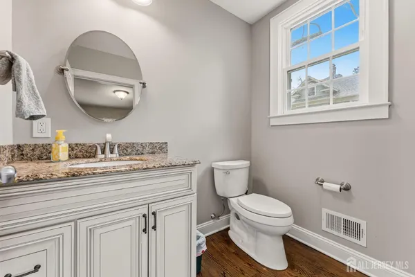 a bed room with a bed and a television