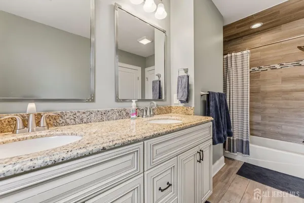 a bedroom with a bed and dresser