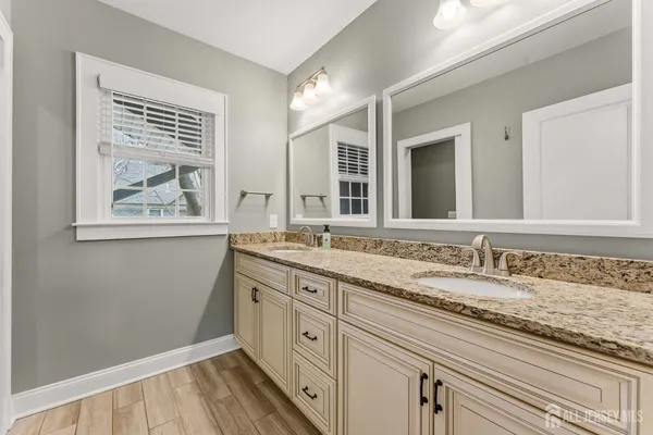 a bed room with a bed and a window