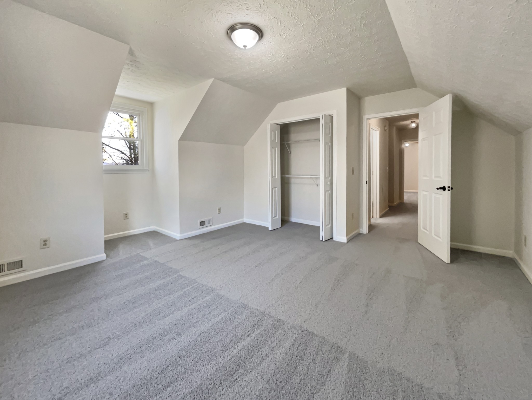 403 Canaan Road Columbia, TN 38401 - Photo 20 of 23 an empty room with wooden floor and windows