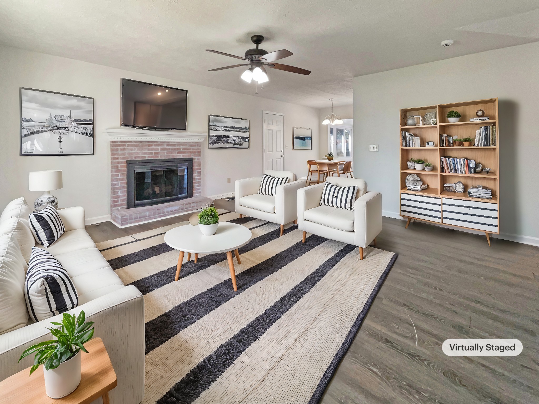403 Canaan Road Columbia, TN 38401 - Photo 2 of 23 a living room with furniture a fireplace and a flat screen tv