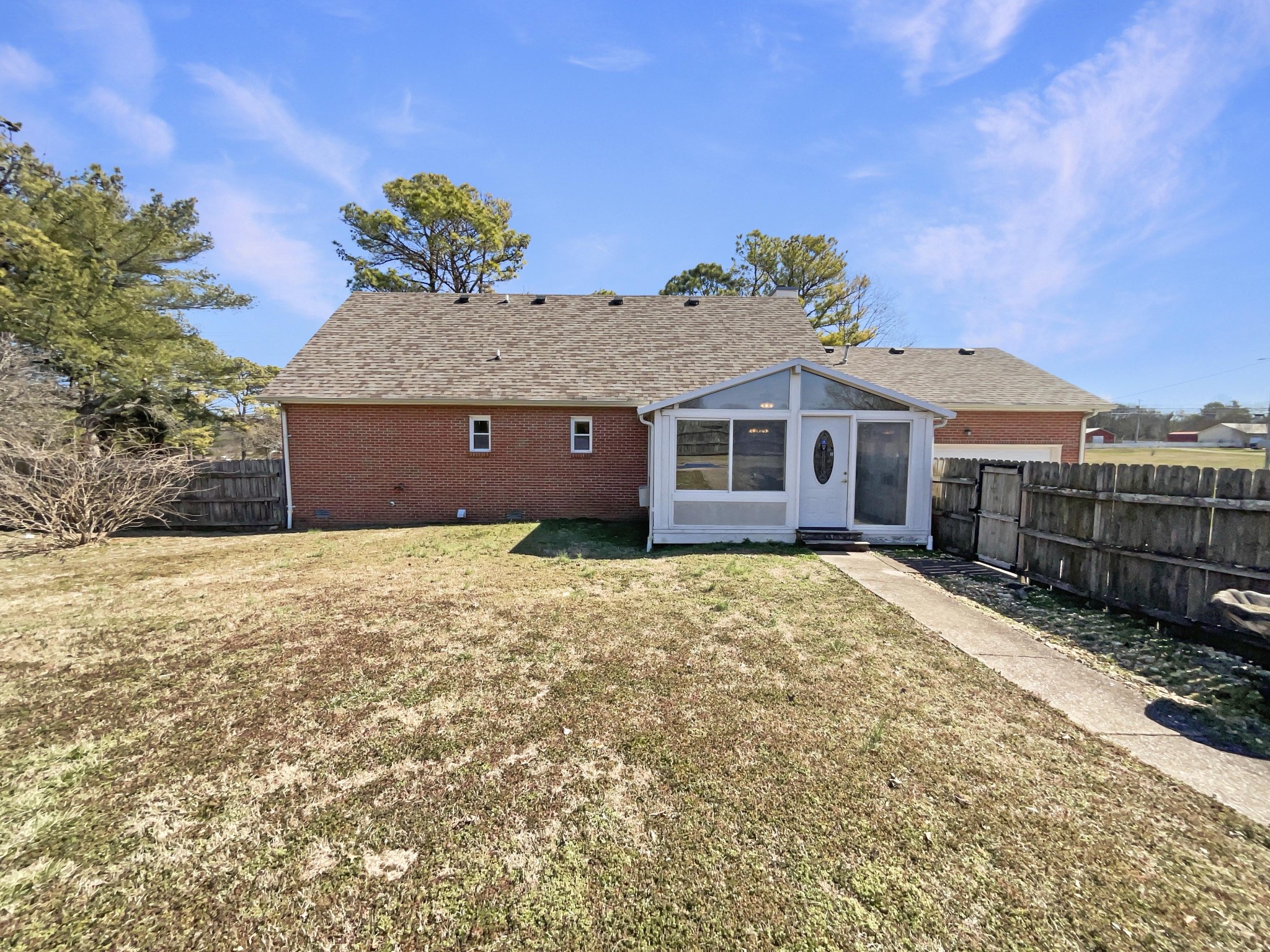 403 Canaan Road Columbia, TN 38401 - Photo 21 of 23 a view of a house with a backyard and a garden