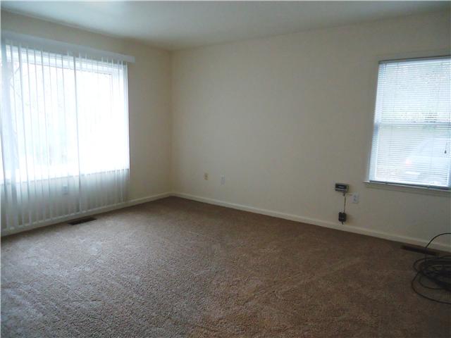 820 Hickory Ridge Trail Columbia, TN 38401 - Photo 7 of 20 Master bedroom on main level with new carpet and tons of natural light...You will love the view from this room!