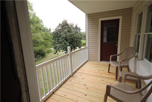 820 Hickory Ridge Trail Columbia, TN 38401 - Photo 8 of 20 Brand new covered wood deck off of kitchen....Perfect for your morning coffee or hot chocolate and watching the wildlife......
