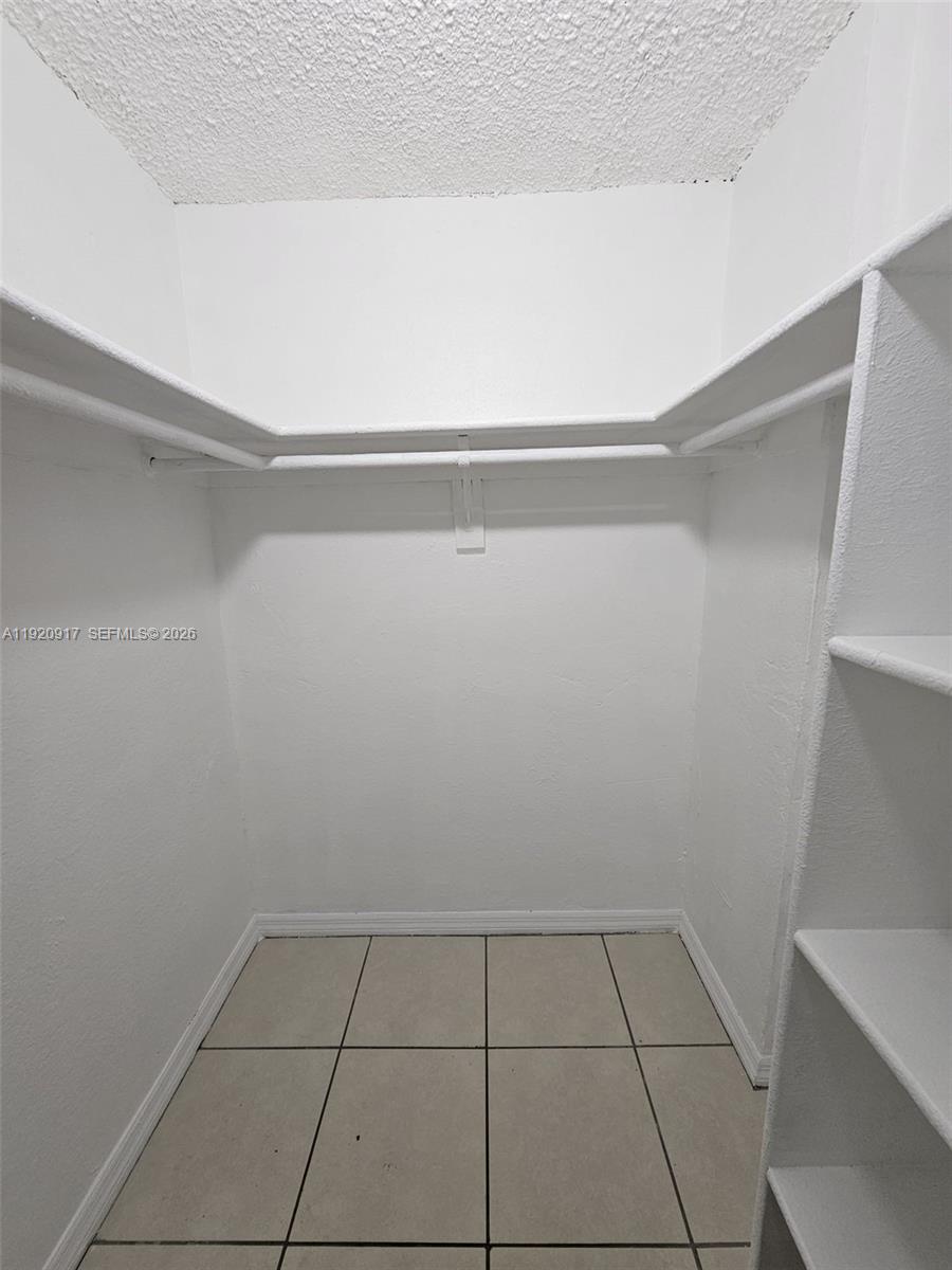 4550 Northwest 9th Street, Unit 217E Miami, FL 33126 - Photo 13 of 14 a view of a closet