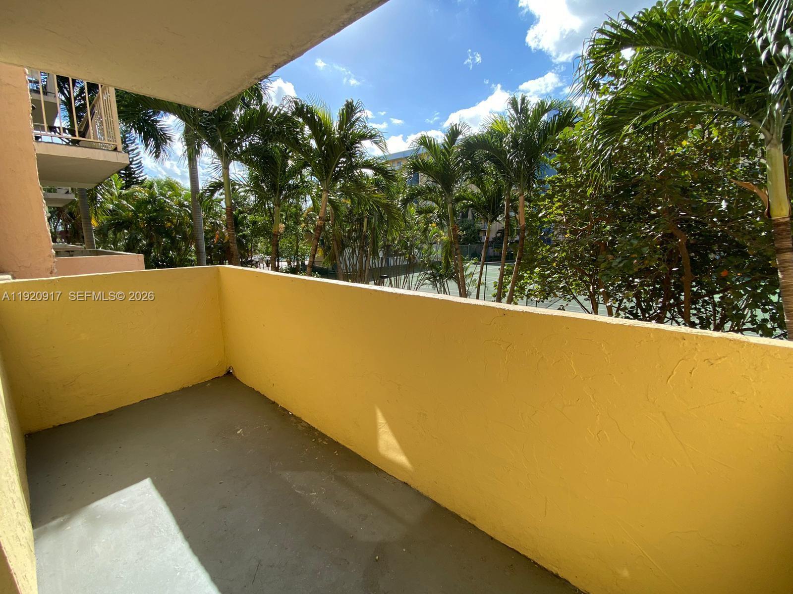 4550 Northwest 9th Street, Unit 217E Miami, FL 33126 - Photo 3 of 14 a view of outdoor space and yard