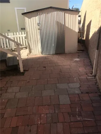 a view of a livingroom with wooden floor