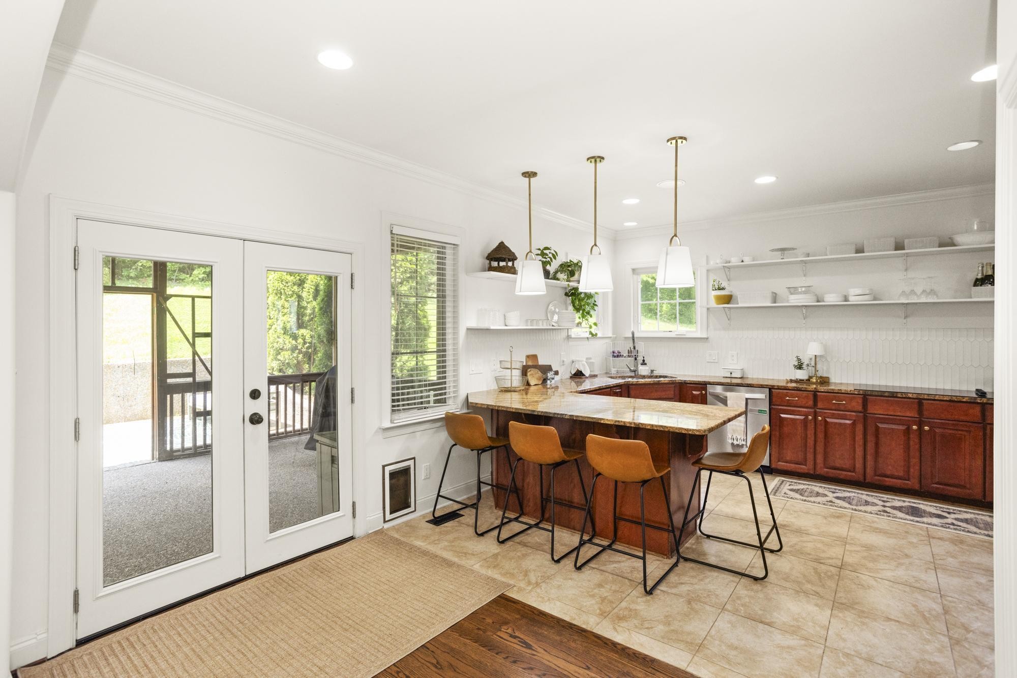 108 Hunters Run Nashville, TN 37209 - Photo 11 of 36 a dining room with a table and chairs