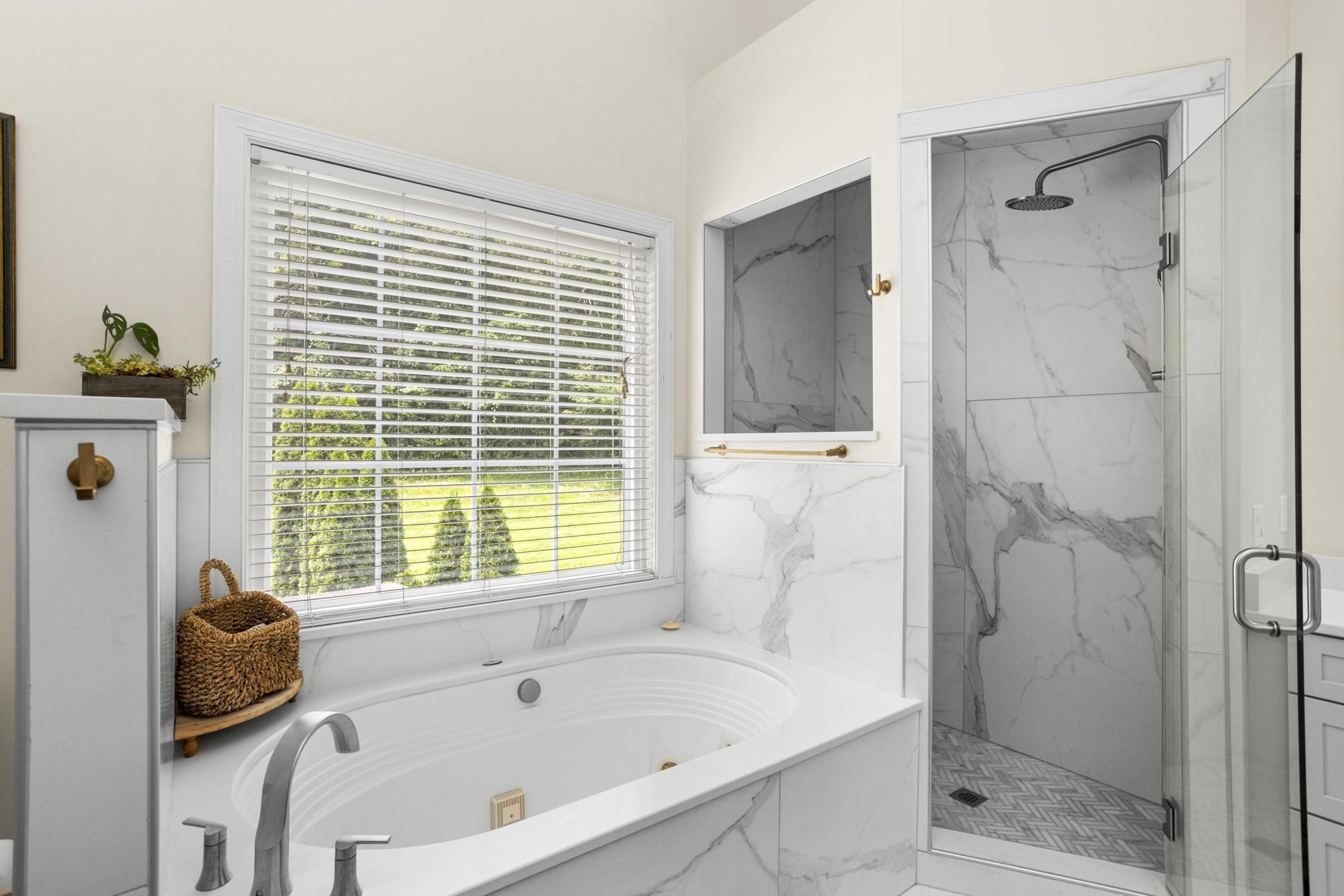 108 Hunters Run Nashville, TN 37209 - Photo 24 of 36 a bathroom with a bathtub and a shower