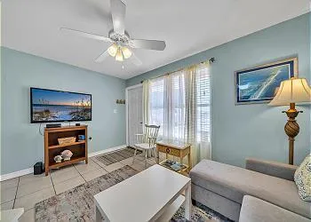 a bedroom with a bed and dresser