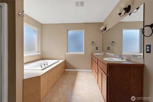 a kitchen with a sink a stove and refrigerator