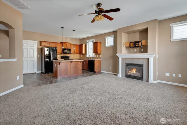 a view of a kitchen with a stove cabinets and a kitchen