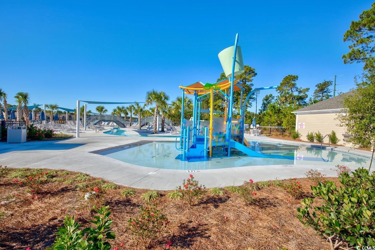 101 Culpepper Way, Unit 1006 Myrtle Beach, SC 29579 - Photo 36 of 40 Community jungle gym featuring a water play area and a community pool