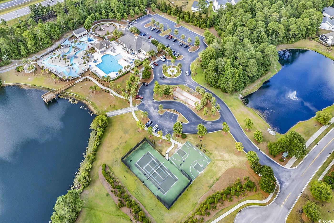 101 Culpepper Way, Unit 1006 Myrtle Beach, SC 29579 - Photo 38 of 40 Aerial view of property and surrounding area featuring a nearby body of water and a pool area