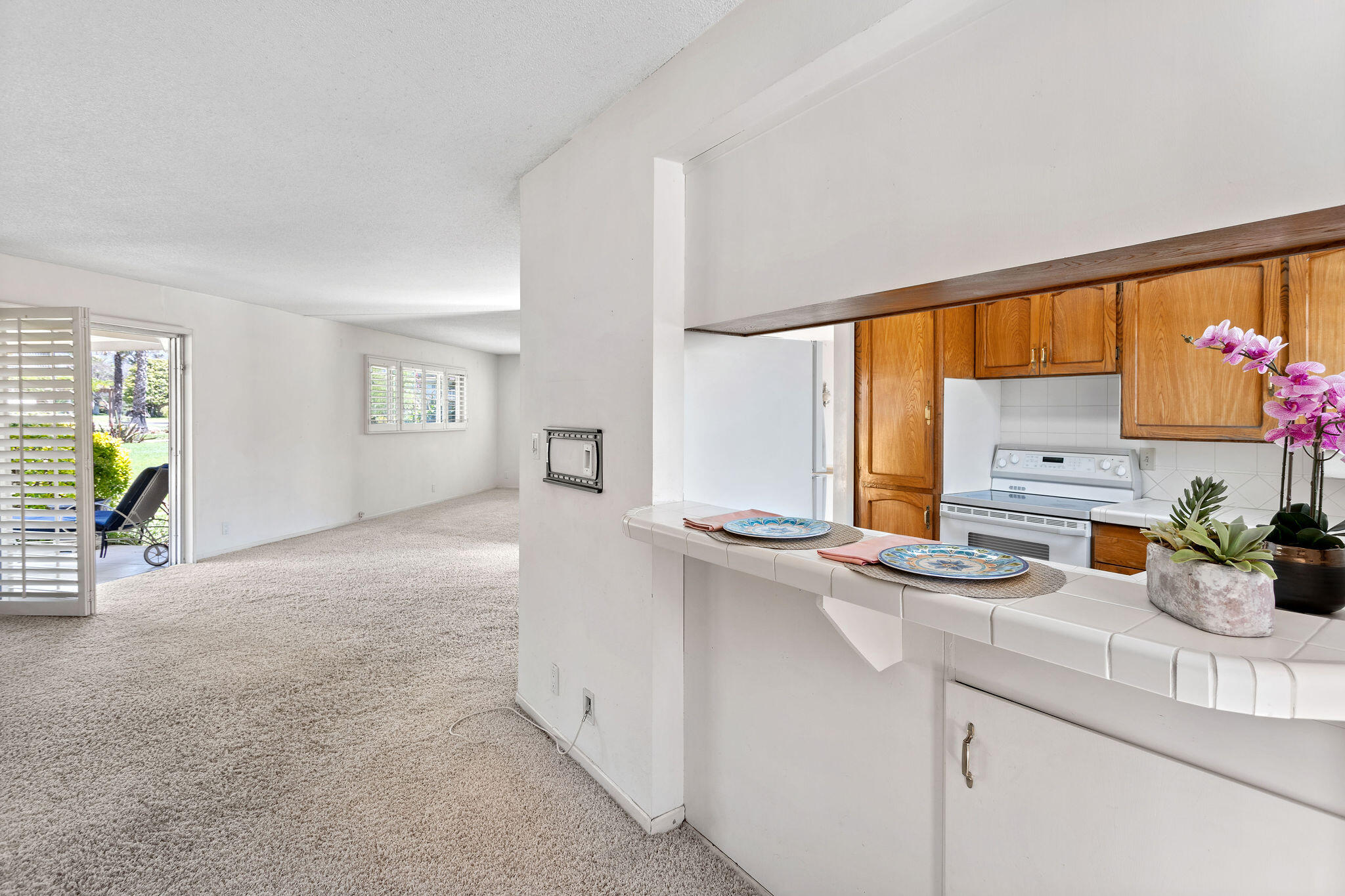 5822 Encina Road, Unit 2 Santa Barbara, CA 93117 - Photo 12 of 42 a kitchen with stainless steel appliances a sink and a window